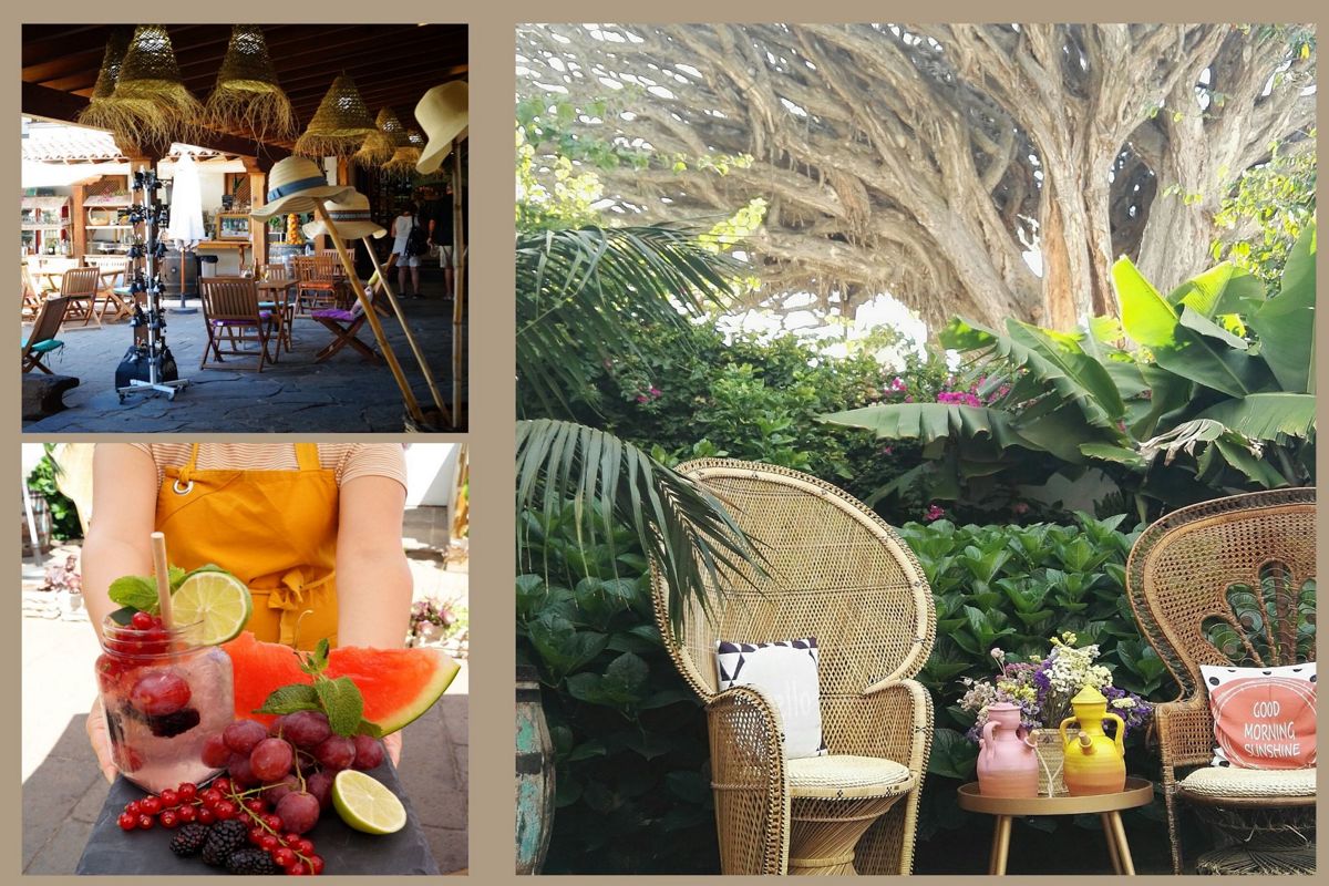 Terras met tafels, decoratieve hoeden en parasols in een restaurant op Tenerife.