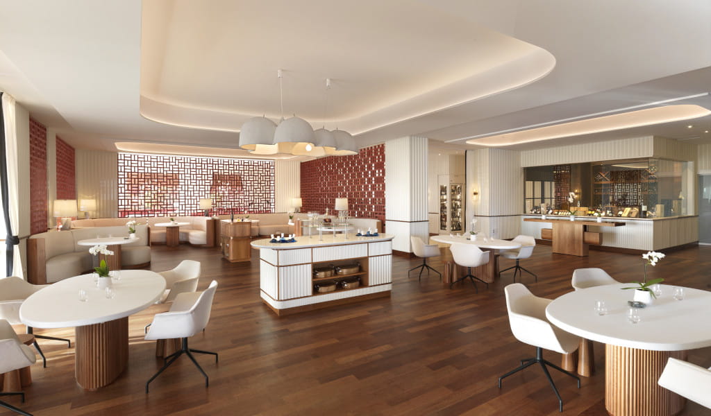 Modern restaurant met witte stoelen en ronde tafels op Tenerife.
